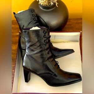 Gently worn, black lace up boots, size 7.5.